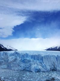 Scenic view of frozen sea against sky