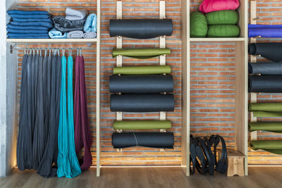 Exercise equipment arranged in rack at yoga studio