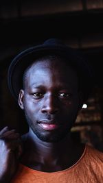 Close-up portrait of young man at home