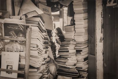 Rear view of woman reading book