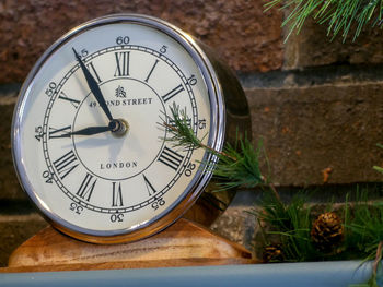 Close-up of clock on the wall