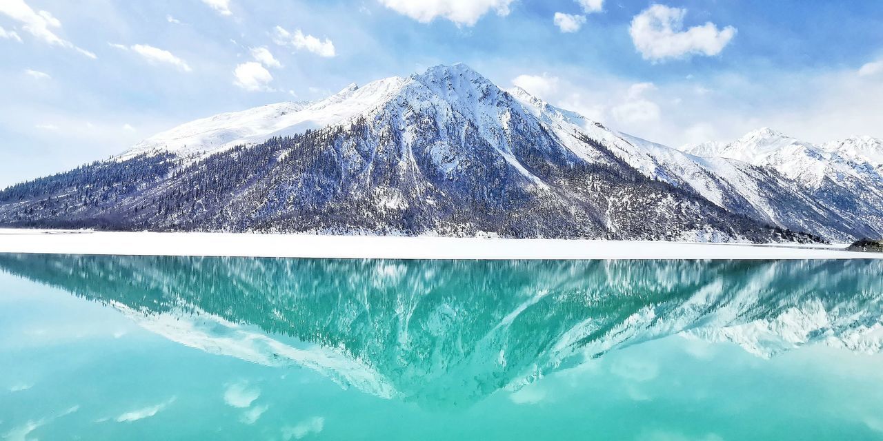 SNOWCAPPED MOUNTAINS AGAINST SKY