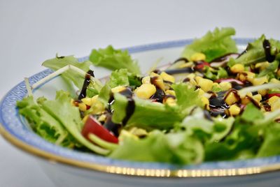 Close-up of chopped fruit salad in bowl