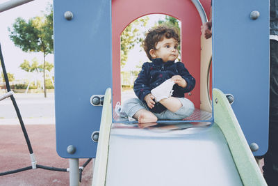 Boy playing in playground