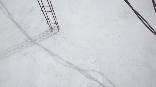 Low angle view of metal against sky