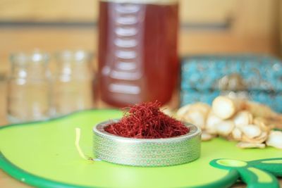 Close-up of dessert in glass container on table