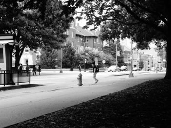 People walking on street in city