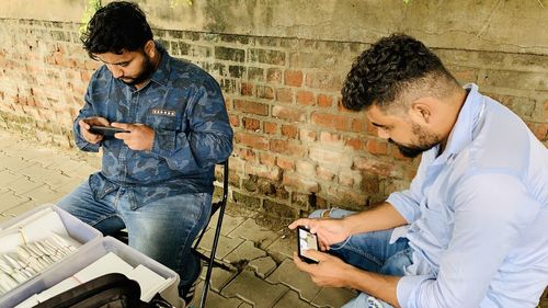 Young man using mobile phone