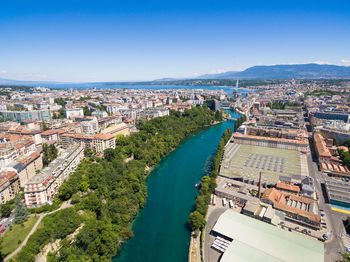 High angle view of river amidst buildings in city