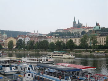 View of buildings in city against clear sky