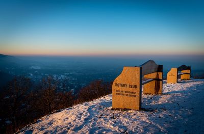 Scenic view of snow covered landscape against sky