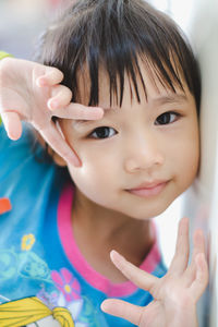 Portrait of cute girl smiling