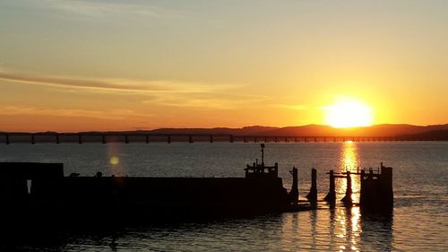 Scenic view of sunset over sea