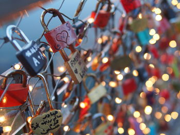 Close-up of love padlocks hanging on metal