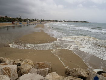 Scenic view of beach against sky