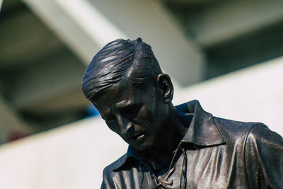 Close-up of statue against blurred background