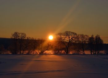 Scenic view of landscape at sunset