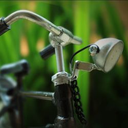 Close-up of water drop on bicycle