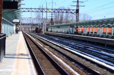 Railroad tracks on railroad station platform