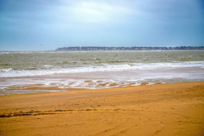 Scenic view of beach against sky