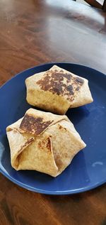 High angle view of bread in plate on table