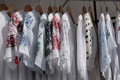 Clothes hanging on rack in store