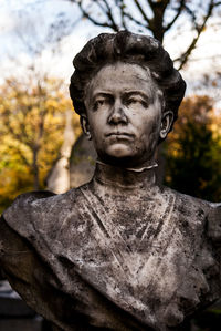 Close-up of angel statue in cemetery