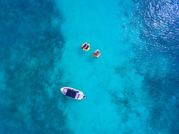 View of people swimming in sea