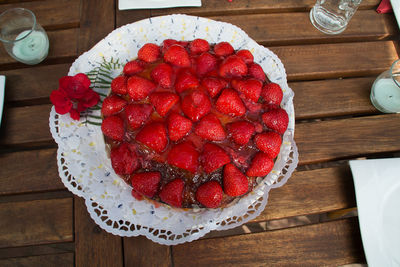 Directly above shot of strawberry cake on table