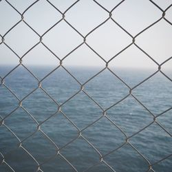 View of calm blue sea against clear sky