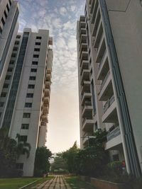 Buildings in city against sky