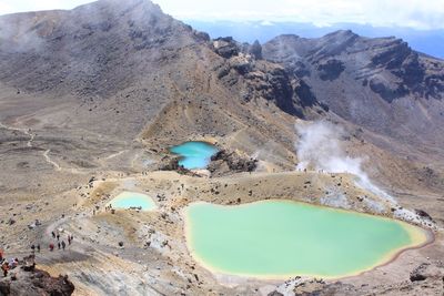 Scenic view of volcanic crater against sky