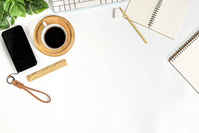 High angle view of coffee cup on table