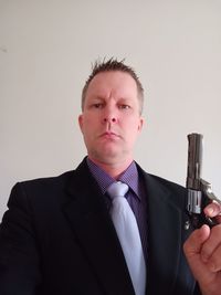 Portrait of man against white background