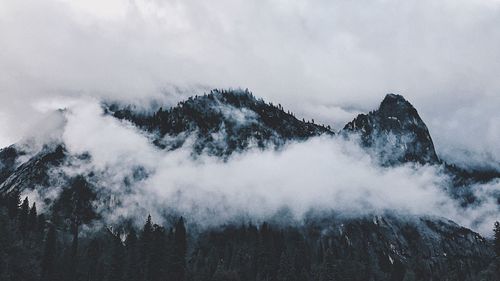 Scenic view of snow mountains against sky