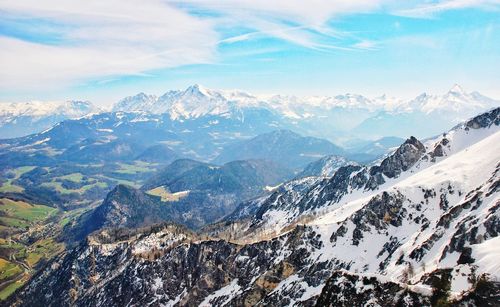 Scenic view of snowcapped mountains against sky