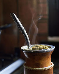 Close-up of drink in jar on table