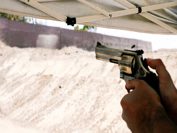 Close-up of man holding camera