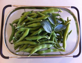 High angle view of vegetables in container on table