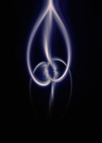 Light painting against black background