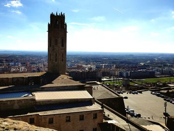 High angle view of city buildings against sky