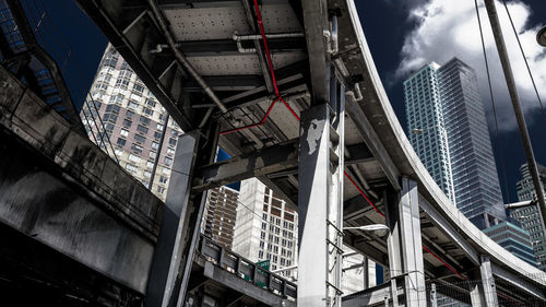 Low angle view of buildings in city against sky