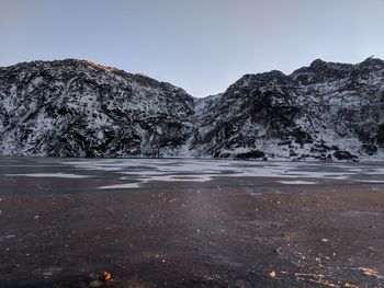 Scenic view of mountains against clear sky