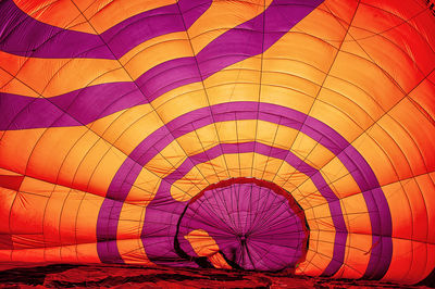 Low angle view of multi colored hot air balloon