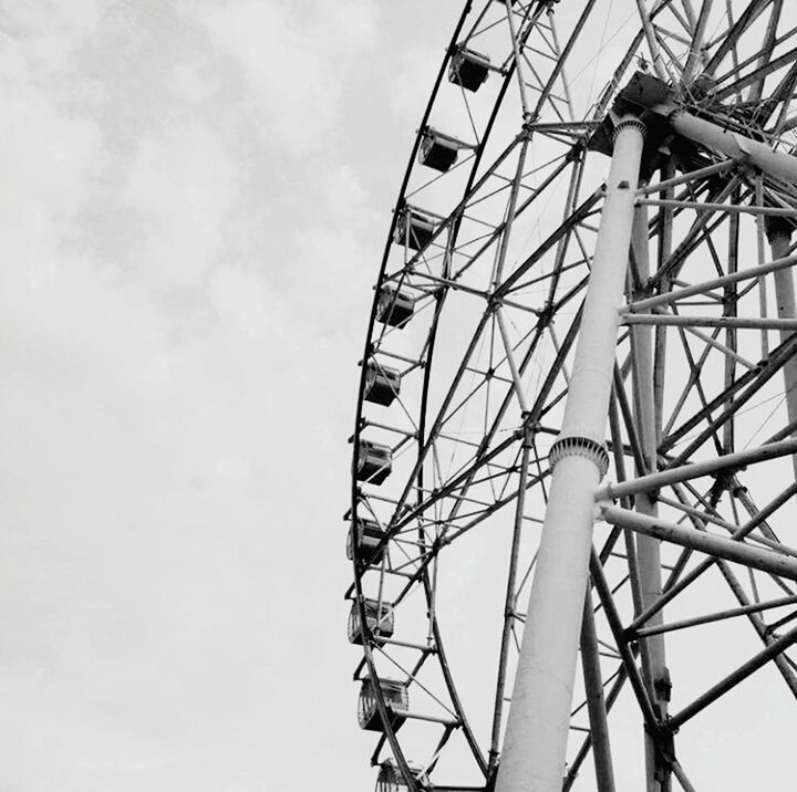 LOW ANGLE VIEW OF FERRIS WHEEL AGAINST SKY