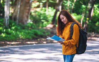 Young woman using mobile phone