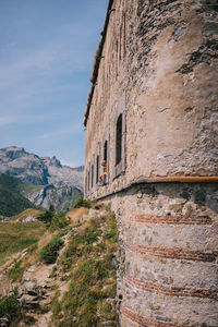 Low angle view of old ruins against sky