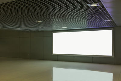 Low angle view of illuminated ceiling of building