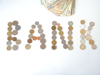 High angle view of coins