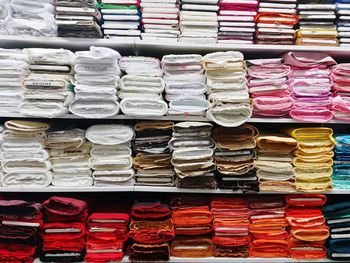 Stack of multi colored objects for sale at store